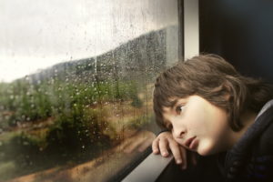 boy train rain